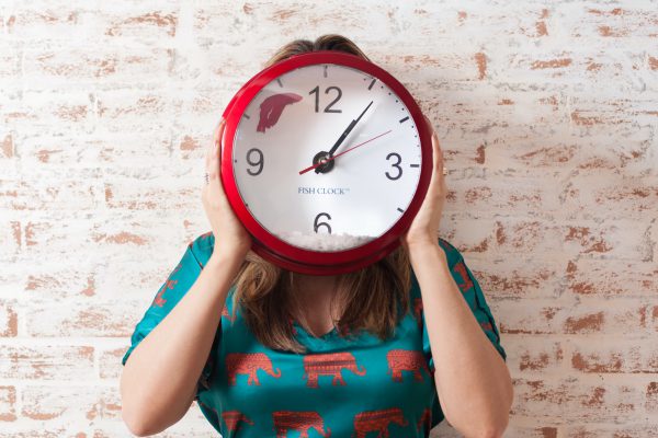 A girl with a clock